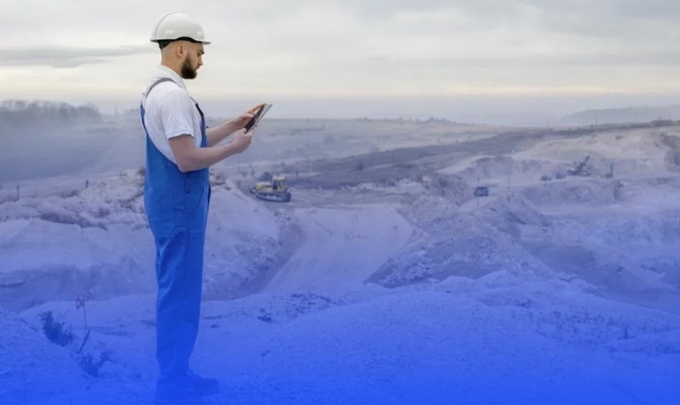 mining-engineer-reading-meter-in-mine